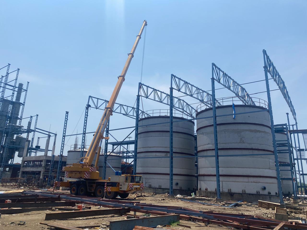 Crane, tanks and structure at Twentyone Sugar Unit II distillery
